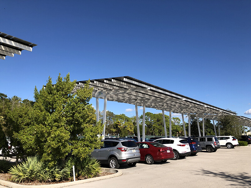 Parking lot with overhead solar panels.
