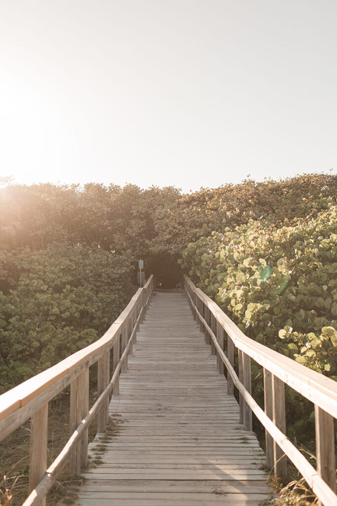 Footbridge leading to a beach.