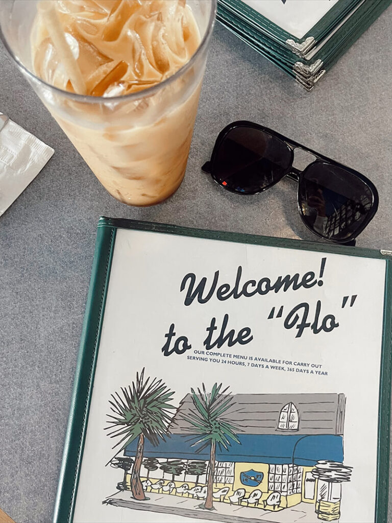 Restaurant Menu with sunglasses and iced coffee